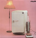 the album cover for The Cure - Three Imaginary Boys