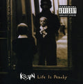 the album cover for Korn - Life Is Peachy