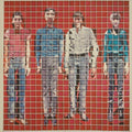 the album cover for Talking Heads - More Songs About Buildings And Food [LP]