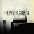 the album cover for The Postal Service - Give Up