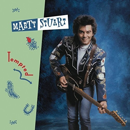 the album cover for Marty Stuart - Tempted