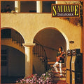 the album cover for Masayoshi Takanaka - Saudade