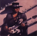 the album cover for Stevie Vaughan Ray - Texas Flood