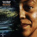 the album cover for Nikki Giovanni - Like A Ripple On A Pond (Blue) [Clear Vinyl]