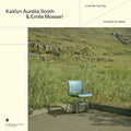 the album cover for Kaitlyn Aurelia Smith &amp; Emile Mosseri - I Could Be Your Dog / I Could Be Your Moon [Transparent Blue LP]
