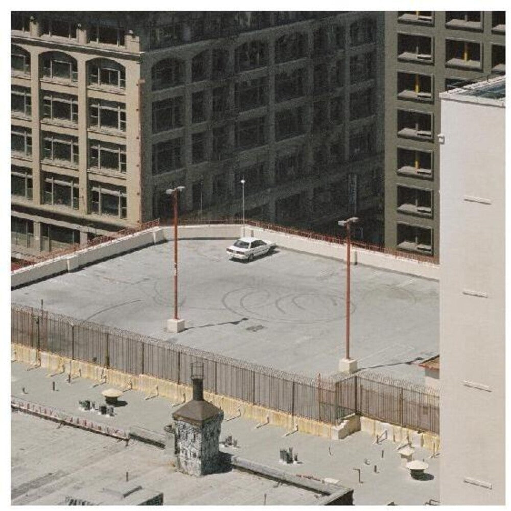 the album cover for Arctic Monkeys - The Car [LP]