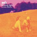 the album cover for Eels - Blinking Lights and Other Revelations [Limited Edition Remastered Crystal Violet 3LP]