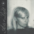the album cover for Hilary Woods - Acts Of Light [Translucent Red LP]