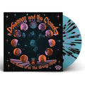 the album cover for Shannon & The Clams - The Moon Is In The Wrong Place [Indie Exclusive Limited Edition Blue w/ Neon Pink + Black Splatter LP]