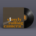 the album cover for Slowly Rolling Camera - Silver Shadow