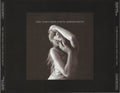 the album cover for Taylor Swift - Tortured Poets Department: The Black Dog [Deluxe]