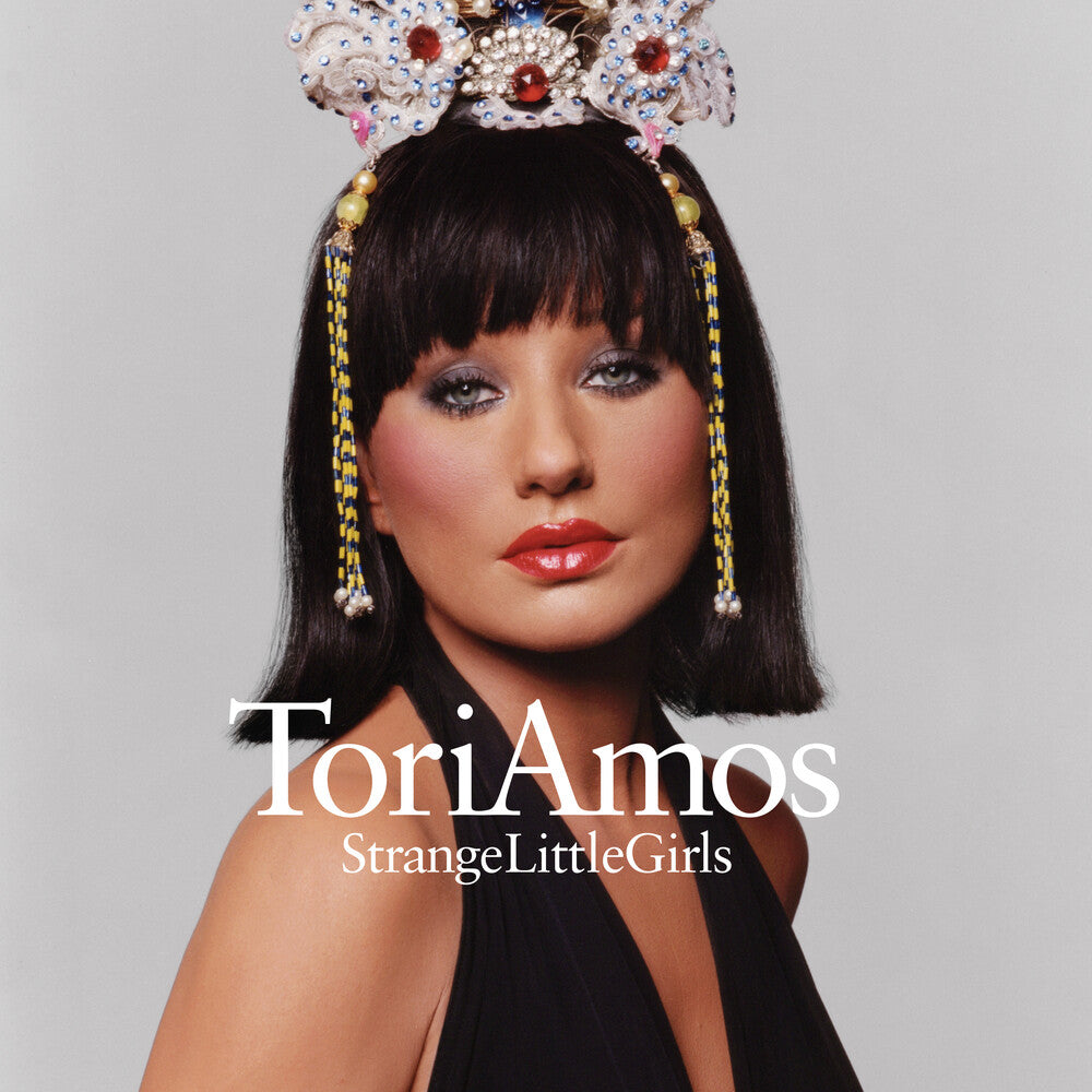 the album cover for Tori Amos - Strange Little Girls [Enjoy The Silence Version]