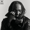 the album cover for Thundercat - Distracted [Indie Exclusive Black Marbled Smoke Effect]