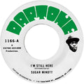 the album cover for Sugar Minott - I'm Still Here B/W I'm Still Here - Version