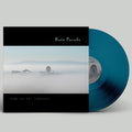 the album cover for Rain Parade - Home In Any Language (Blue) [Colored Vinyl]