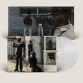 the album cover for Ezra Collective - Here Because Of Hope [Indie Exclusive Translucent White]