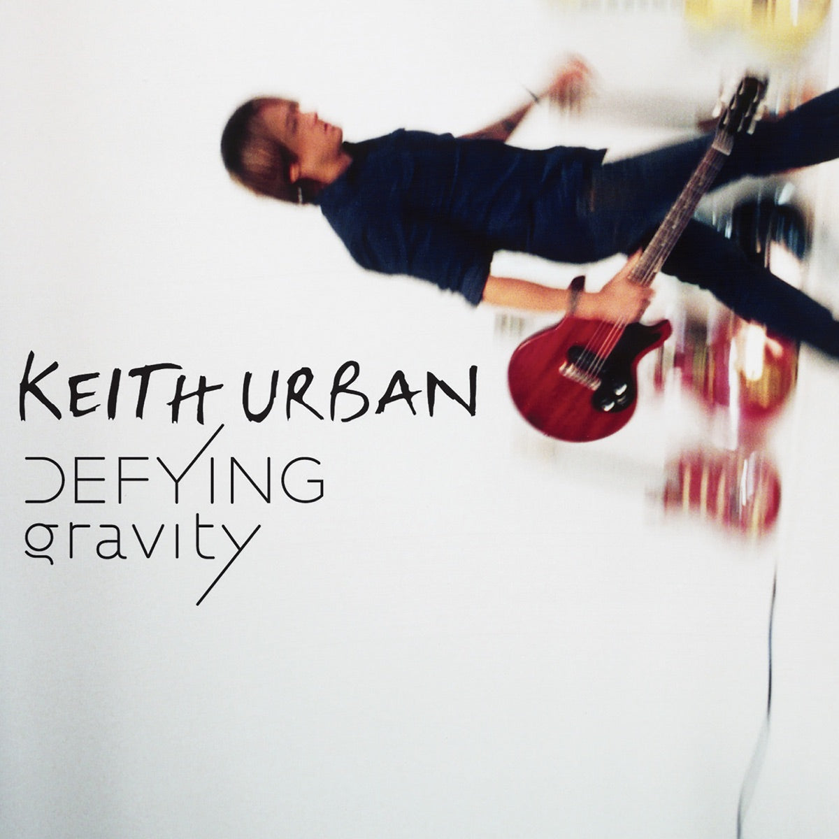 Keith Urban — Defying Gravity (Deluxe Video Edition), vinyl LP album cover